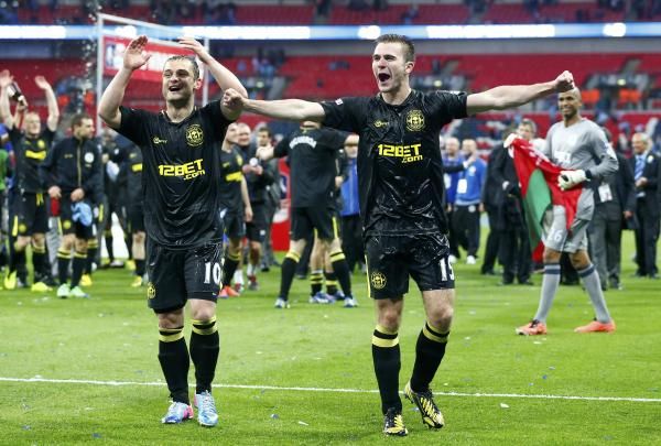 كالوم مكمانمان (يمين)