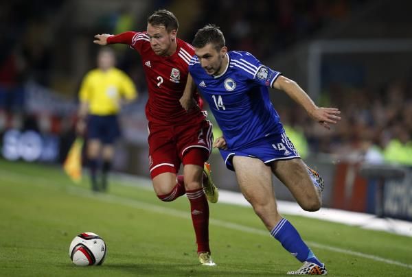 تينو سوسيتش  (يمين)