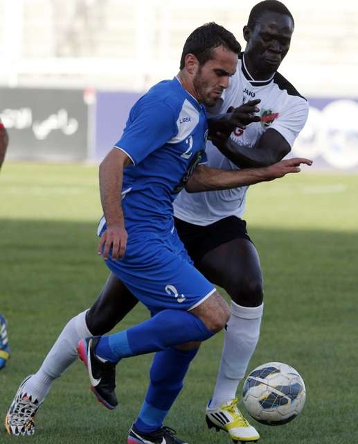 ​من لقاء الأهلي والرمثا ذهاباً