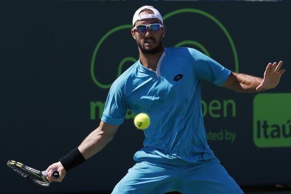 2015-03-30t174332z_1623648324_nocid_rtrmadp_3_tennis-miami-open-nishikori-v-troicki_reuters