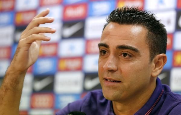 2015-05-21t132118z_187955822_gf10000102673_rtrmadp_3_soccer-spain-xavi_reuters