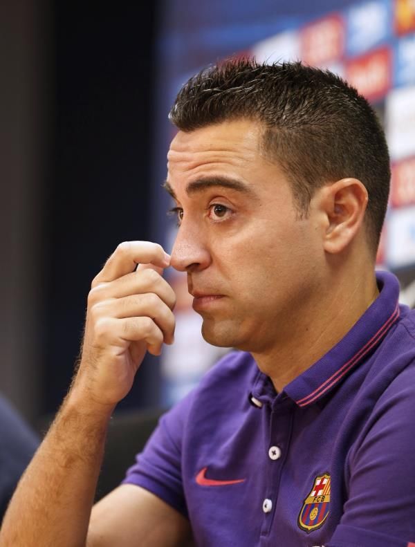 2015-05-21t132137z_415447673_gf10000102681_rtrmadp_3_soccer-spain-xavi_reuters
