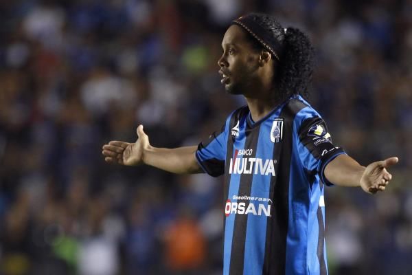 2014-09-18t045609z_1938965916_gm1ea9i0zp301_rtrmadp_3_soccer-mexico-ronaldinho_reuters