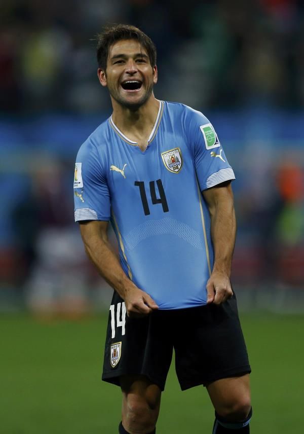 2014-06-19t212903z_813616418_tb3ea6j1qbb1m_rtrmadp_3_soccer-world-m23-uru-eng_reuters