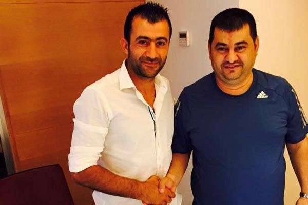 رئيس النادي سمير دبوق مصافحاً حجيج