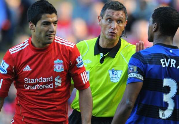 luis-suarez-patrice-evra_j2gor65chfra1tan2su3eduan