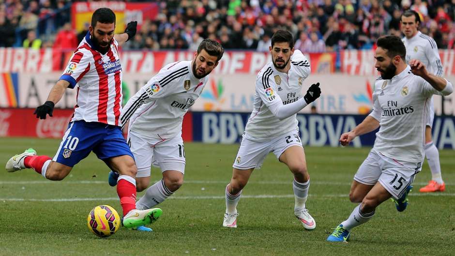 arda-turan-nacho-isco-carvajal-atletico-madrid-real-madrid-la-liga-07022015_1iirdv40jfyh61b7okoise8xs0