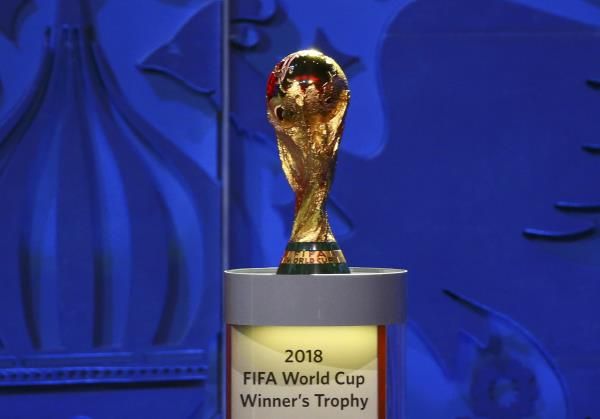 2015-07-25t152527z_1614997735_lr2eb7p16u1ou_rtrmadp_3_soccer-world-draw_reuters