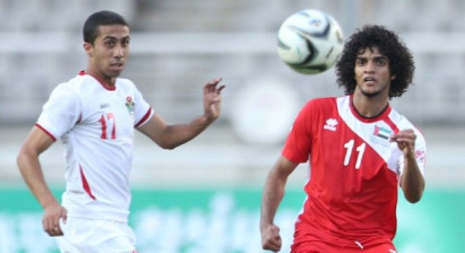 سمير رجا "يسار" خلال مشاركاته مع المنتخب الأولمبي