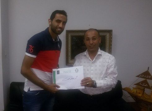 الأسمر ومحمد مصطفى بعد انجاز العقد 