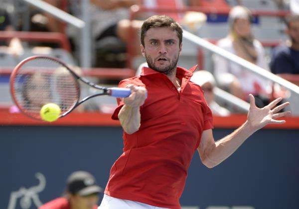 2015-08-10t194624z_840625839_nocid_rtrmadp_3_tennis-rogers-cup-seppi-vs-simon_reuters