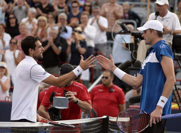 2015-08-14t231644z_298655172_nocid_rtrmadp_3_tennis-rogers-cup-isner-vs-chardy_reuters