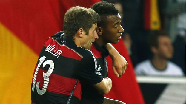 296015-jerome-boateng-and-thomas-muller-for-germany