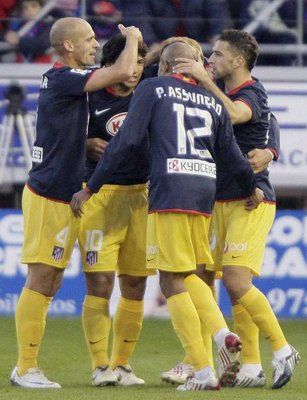 لاعبو خيتافي يحتفلون بهدفهم ضد برشلونة