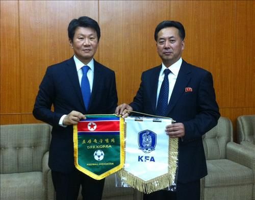 صورة تذكارية بين الاتحادين الكوري الجنوبي والشمالي