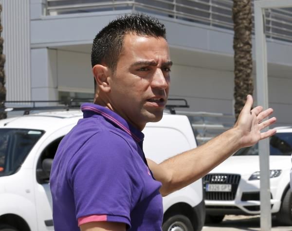 2015-05-21t130005z_469833246_gf10000102617_rtrmadp_3_soccer-spain-xavi_reuters