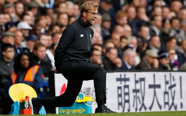 klopp_face_knees_3475358b