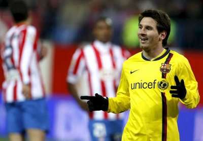 ميسي محتفلا بثلاثيته أمام أتلتيكو مدريد
