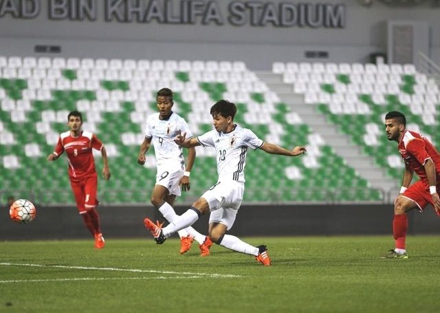 تاكومي مينامينو عند تسجيله هدف بمرمى سوريا