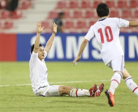 شينجي اوكازاكي بعد تسجيله هدف الفوز بمرمى العراق في 2013
