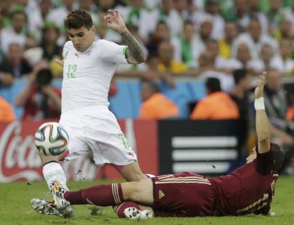 2014-06-26t200751z_1871866163_tb3ea6q1jzgdo_rtrmadp_3_soccer-world-m48-alg-rus_reuters