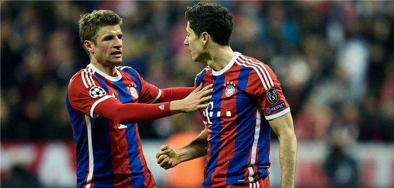 thomas-mueller-robert-lewandowski-56352541