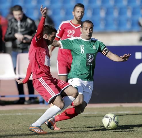 لقطة من مباراة لفريق الوحدات 