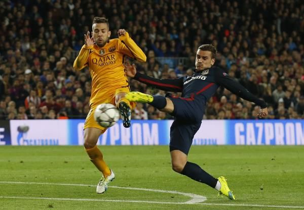 جوردي البا (يسار) مع جريزمان