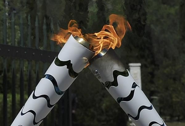 2016-04-21t111424z_593605630_lr1ec4l0v7p9s_rtrmadp_3_olympics-rio-torch_reuters