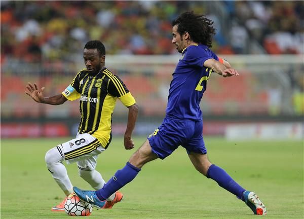 حسين عبدالغني (يمين) 