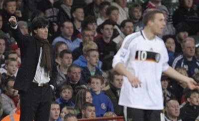 بودولسكي و بالخلف مدرب المنتخب الألماني لوف