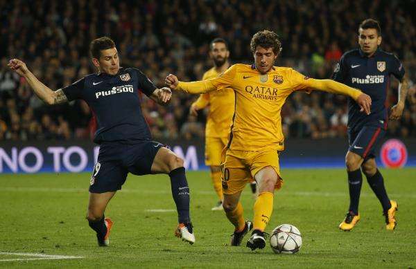 سيرجي روبيرتو في مباراة فريقه أمام أتليتكو مدريد
