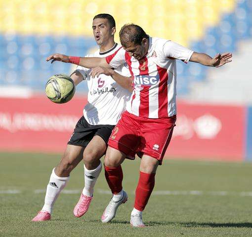لقاء سابق بين الأهلي وشباب الأردن 