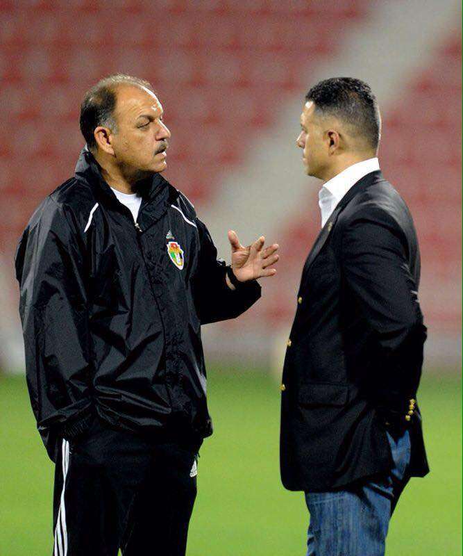 أسامة طلال مع حمد أثناء العمل مع منتخب الأردن