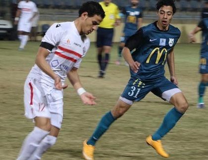 أكرم توفيق (يمين)