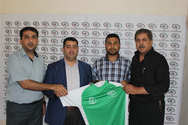 جانب من توزيع الملابس الرياضية 