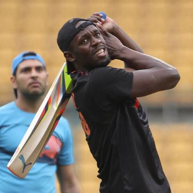 usain-bolt-playing-cricket