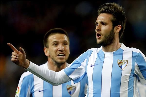 دوجي كوب (يمين)