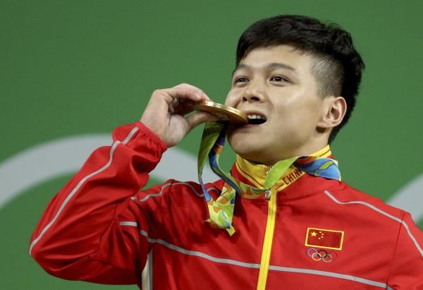 2016-08-08t004339z_703160271_rioec88020m8y_rtrmadp_3_olympics-rio-weightlifting-m-56kg_reuters