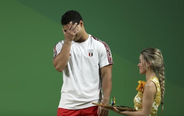 2016-08-11t000459z_376578621_rioec8b00892m_rtrmadp_3_olympics-rio-weightlifting-m-77kg_reuters