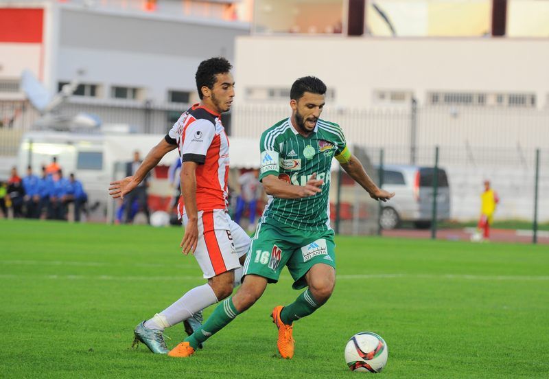 محمد أولحاج (يمين)