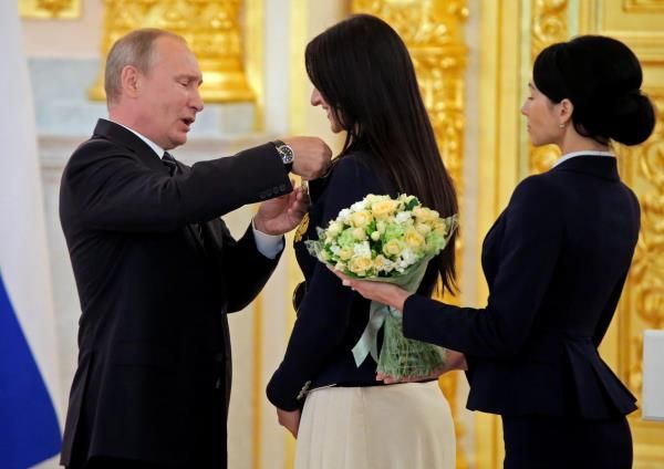 2016-08-25t105336z_1983850671_d1betxlnwyaa_rtrmadp_3_olympics-rio-putin_reuters