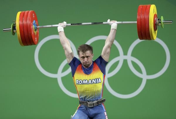 2016-08-12t234741z_215661638_rioec8c1u3frh_rtrmadp_3_olympics-rio-weightlifting-m-85kg_reuters