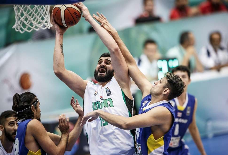 من مباراة العراق وتايلاند