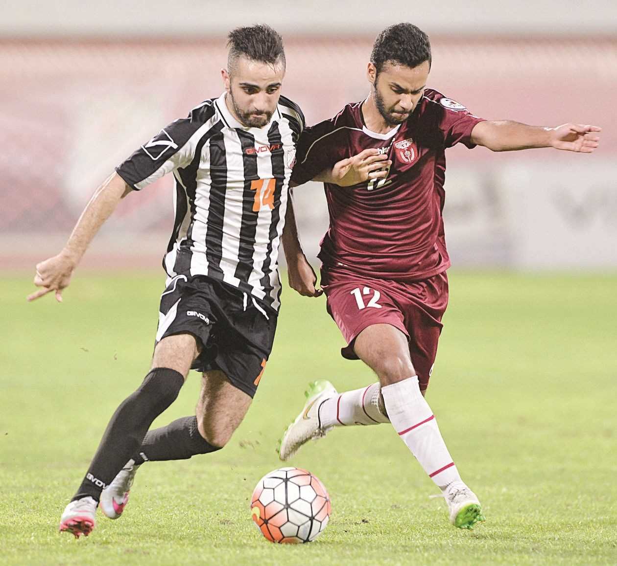 عموري (يسار)