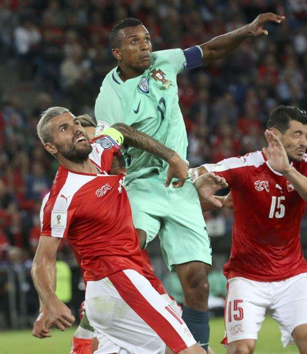 2016-09-06t203222z_1389220408_lr1ec961l1ojf_rtrmadp_3_soccer-worldcup-swi-por_reuters