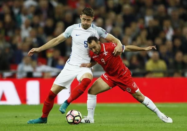 2016-10-08t174016z_118950016_mt1aci14635607_rtrmadp_3_soccer-worldcup-eng-mlt_reuters