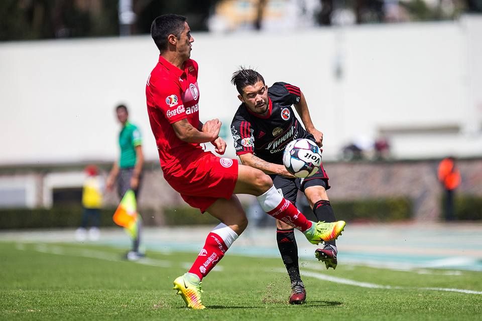 جانب من مباراة تيخوانا وتولوكا 