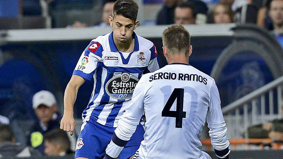 راموس يرتدي قميص أوزيل تحت قميصه