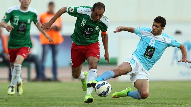من مواجهة سابقة بين الوحدات والفيصلي